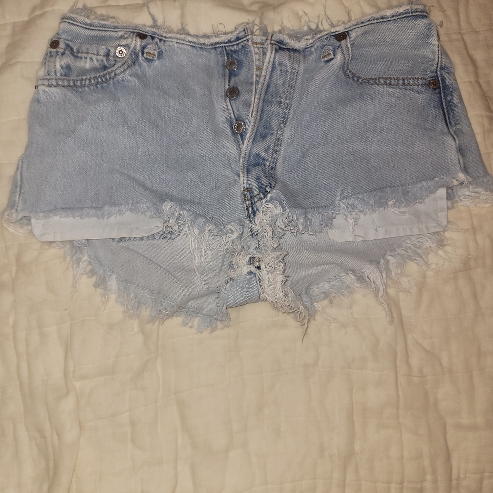 Cut off Levi's Shorts pockets out, super trendy. Favorite pair